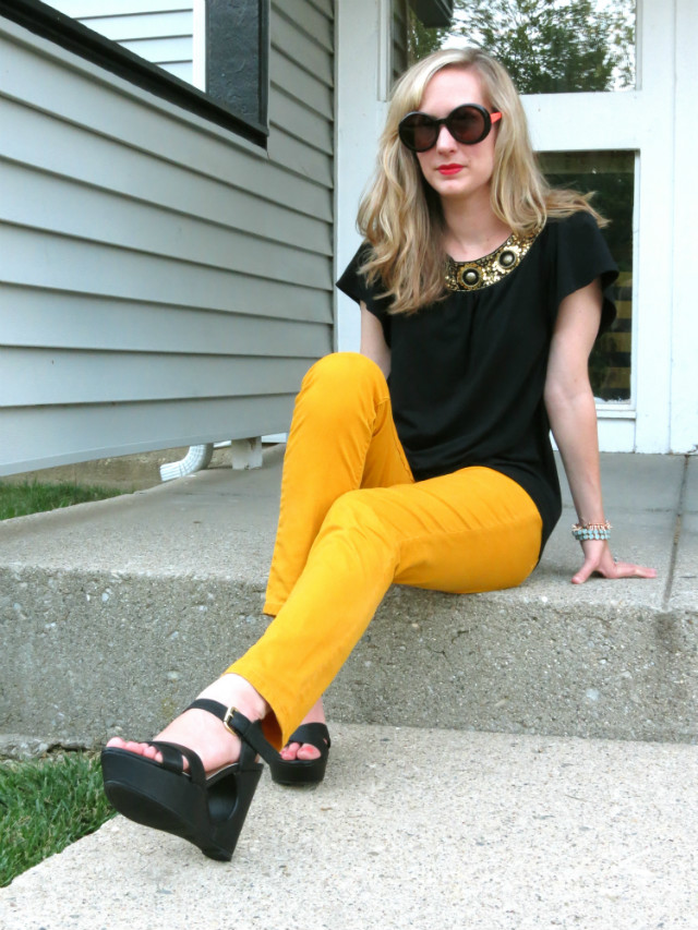 black and yellow, yellow jeans, wedges, wavy hair