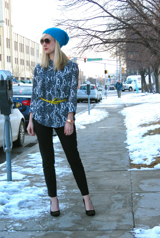 h&m snake print top, belted tunic, ann taylor skinny pants, blue beanie, just cavalli aviators, anne klein studded pumps