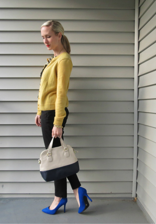 yellow cashmere cardigan, skinny black pants, cobalt pumps, colorblock bag, cluster pearl necklace