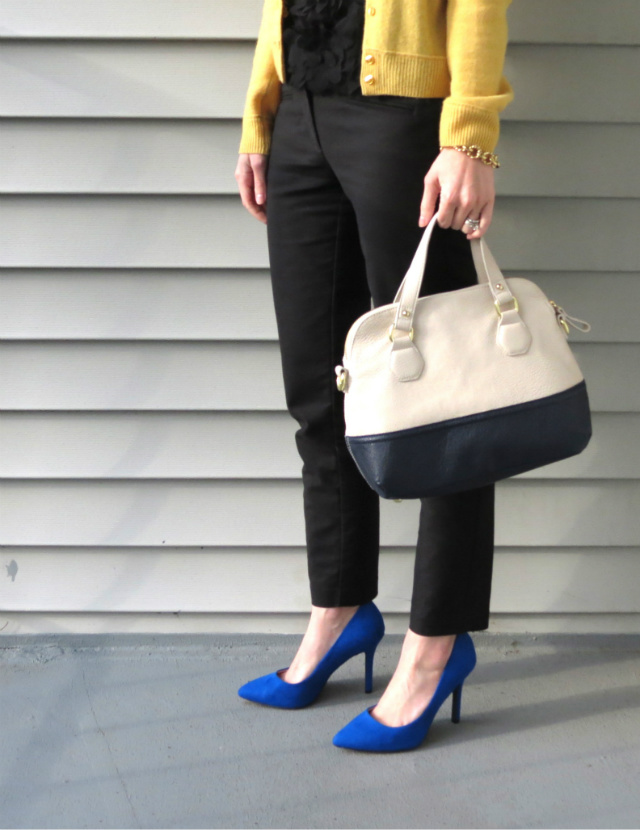 yellow cashmere cardigan, skinny black pants, cobalt pumps, colorblock bag, cluster pearl necklace