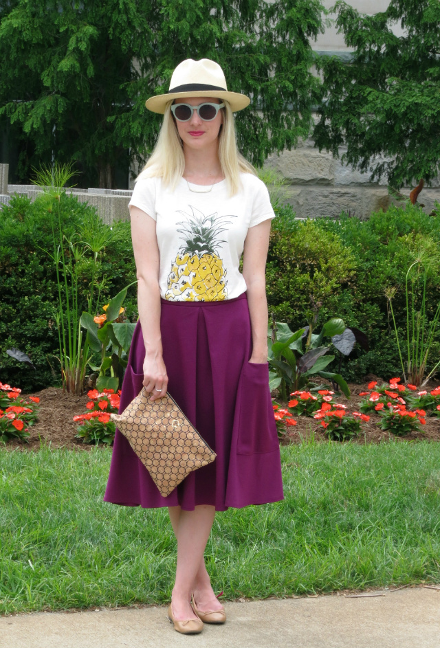 cork clutch, ann taylor pineapple tee, asos midi skirt, j crew panama hat