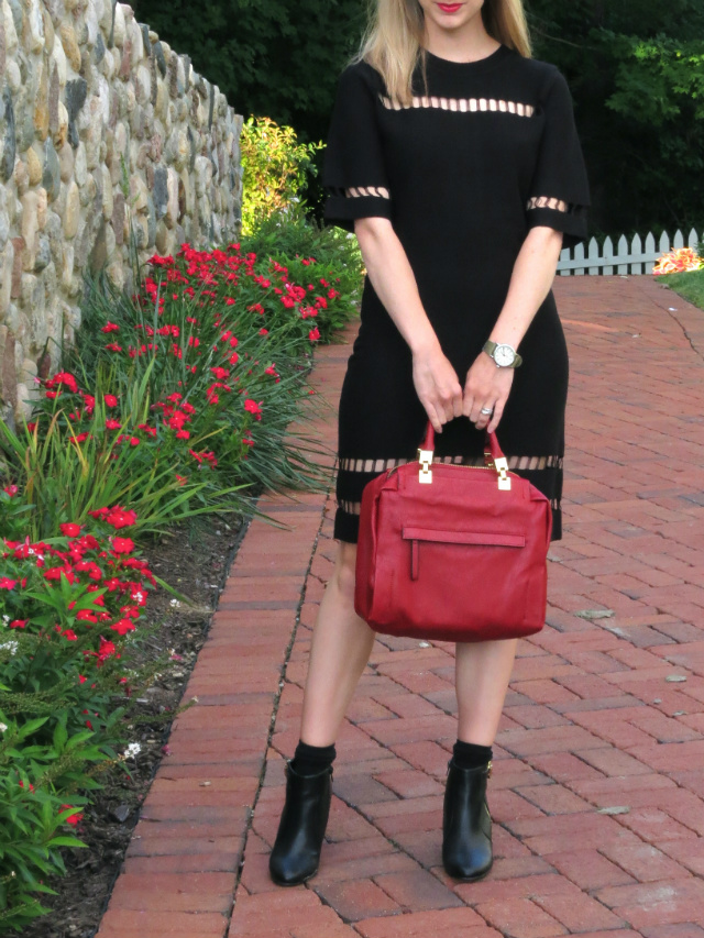 joa black sweater dress, red satchel, black ankle boots with socks