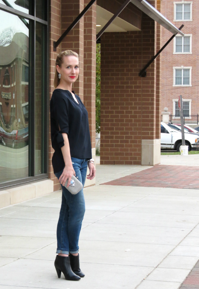 tie sleeve top, distressed jeans, black heeled ankle boots, jeweled clutch, chanel red lipstick, bloomington indiana style blog