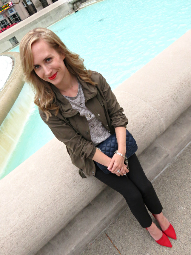 embellished tee, skinny black pants, army green jacket, red d'orsay pumps, chanel la flamboyant lipstick, express navy quilted bag