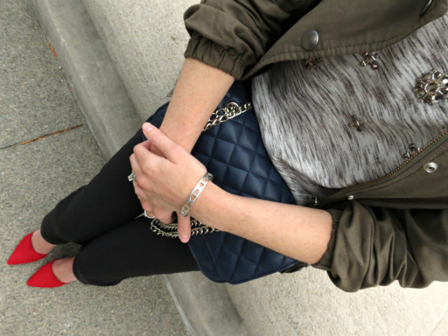 embellished tee, skinny black pants, army green jacket, red d'orsay pumps, chanel la flamboyant lipstick, express navy quilted bag