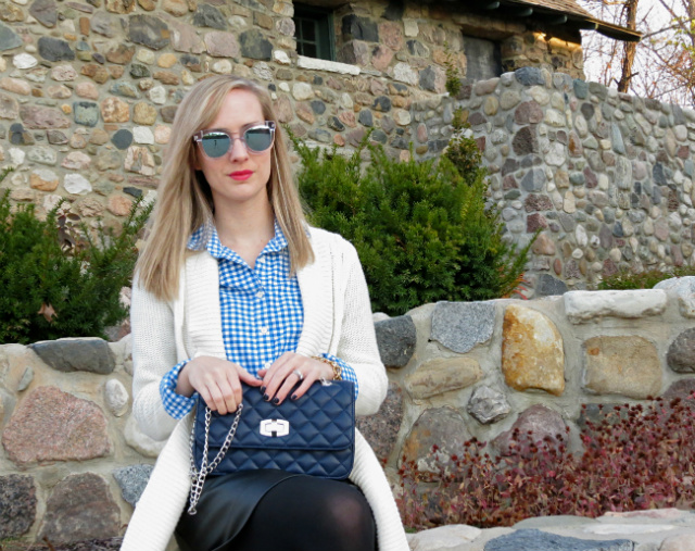 faux leather mini, gingham shirt, cream cardigan, quilted bag, clear mirrored sunglasses