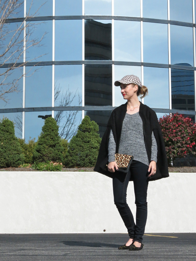 tweed baseball cap, tweed black cape, leopard foldover clutch, studded loafers, layered rose gold necklaces