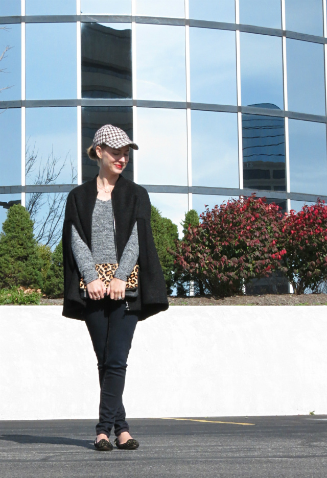 tweed baseball cap, tweed black cape, leopard foldover clutch, studded loafers, layered rose gold necklaces