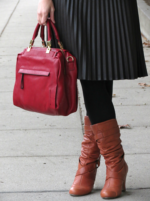 yellow sweater, leather pleated midi skirt, slouchy boots, statement necklace, navy quilted bag, red satchel, cashmere