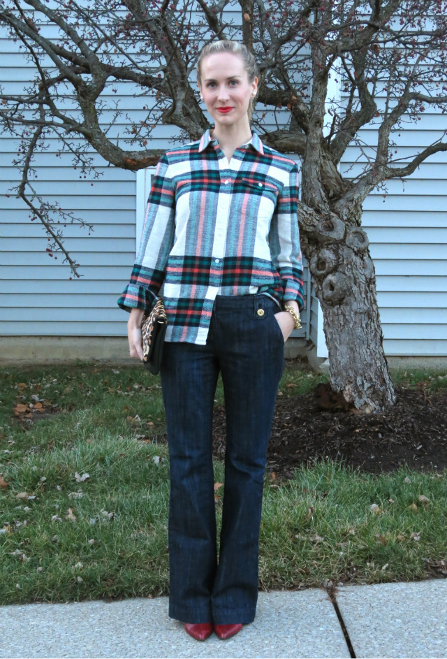 J Crew plaid flannel shirt, flared jeans, red boots, leopard clutch, double pearl earrings