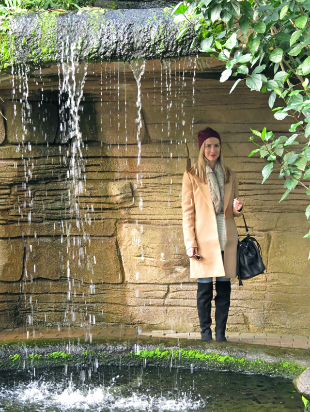 camel coat, cream sweater, faux fur scarf, over the knee boots, studded beanie, garfield park conservatory