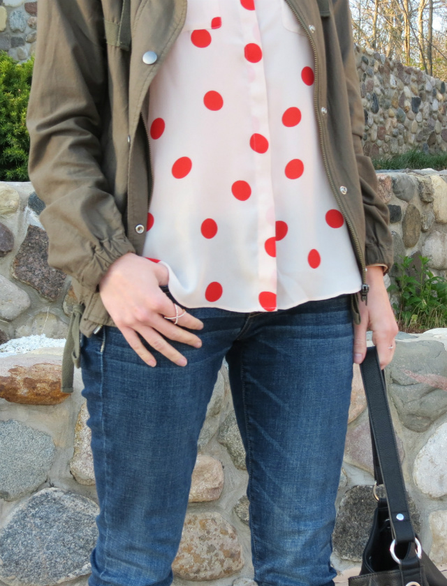 red polka dot blouse, cutout ankle boots, army jacket, bucket bag