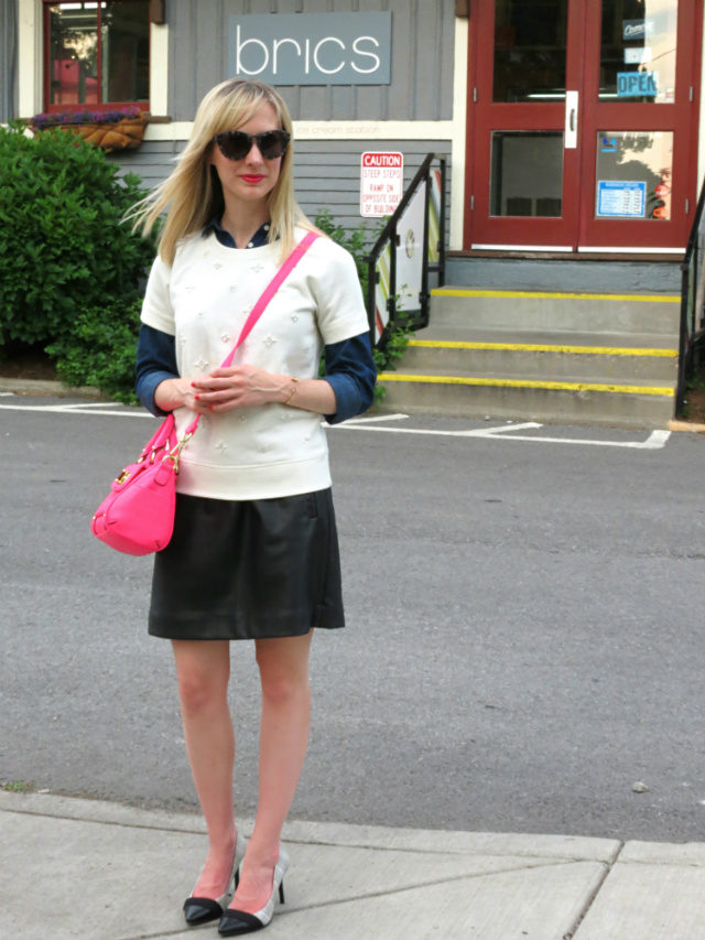 leather skirt, short sleeve sweatshirt, dark chambray shirt, cap toe heels, neon pink bag, broad ripple ice cream station