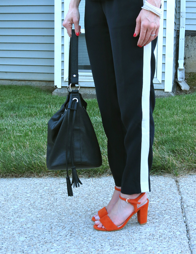 polka dot shirt, J. Crew tuxedo pants, bucket bag, neon skinny belt, orange suede sandals