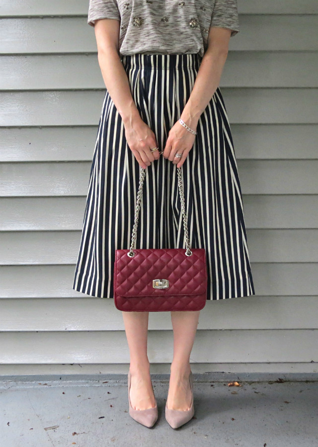 J. Crew striped midi skirt, embellished tee, gray suede pumps, bugundy quilted bag