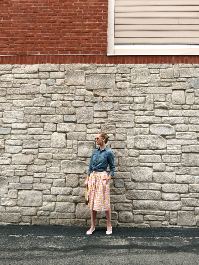 knotted chambray shirt, retro print midi skirt, white bow flats, cork clutch