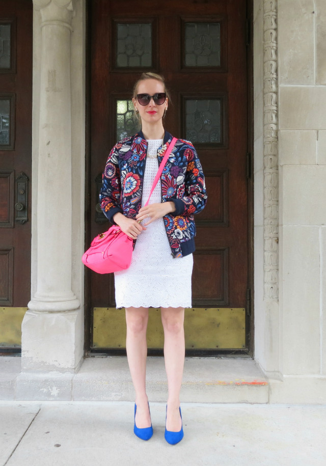 floral bomber jacket, white dress, cobalt suede heels, hot pink bag