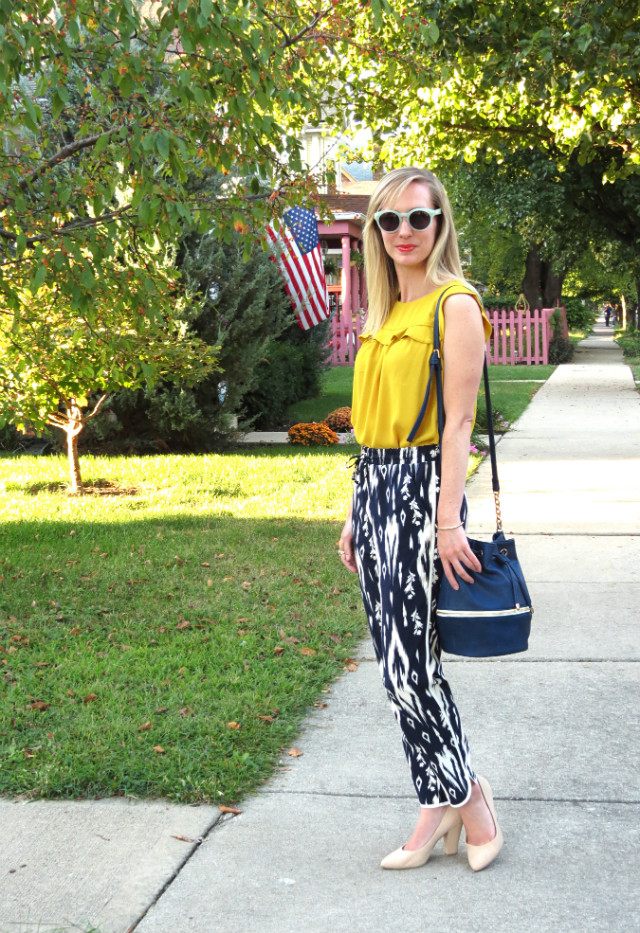 mustard yellow top, ikat print joggers, nude pumps, bucket bag, how to wear jogger style pants