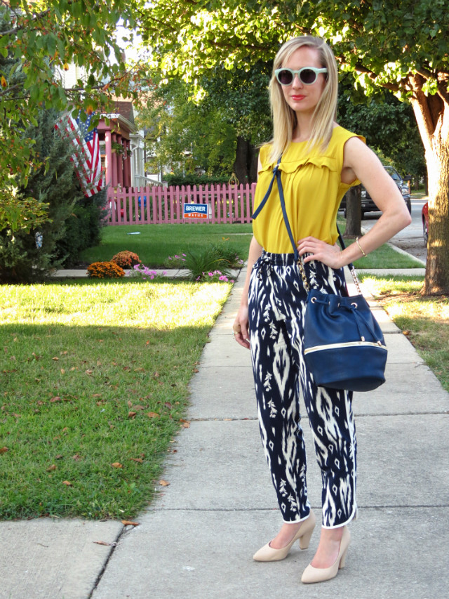 mustard yellow top, ikat print joggers, nude pumps, bucket bag, how to wear jogger style pants