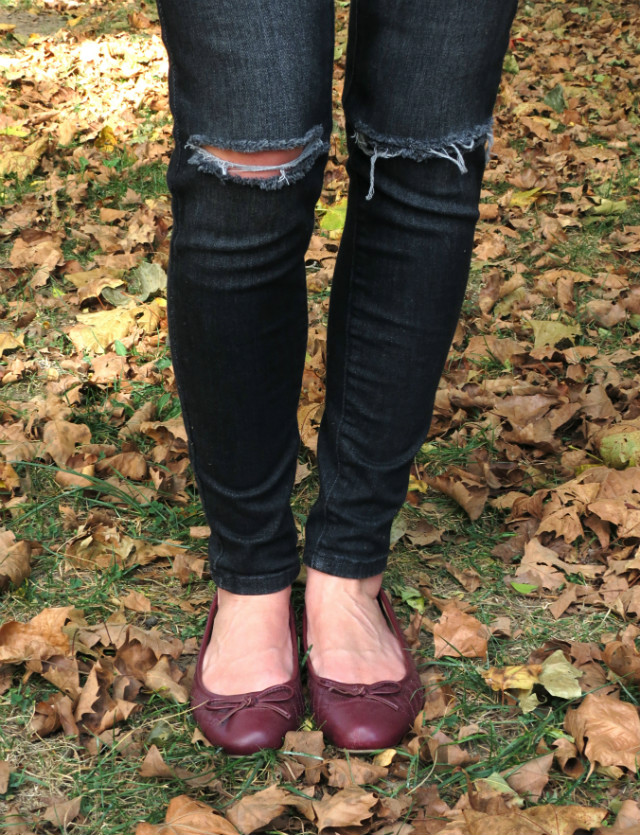 J. Crew wool hat, blue leopard top, black distressed skinny jeans