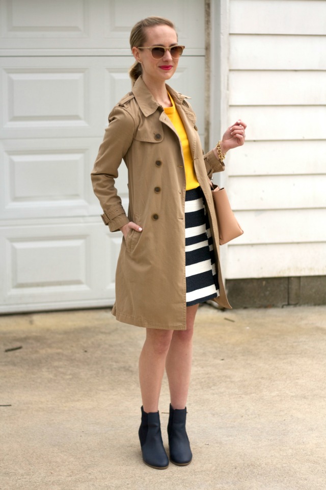 Loft striped mini, yellow sweater, navy ankle boots, trench coat