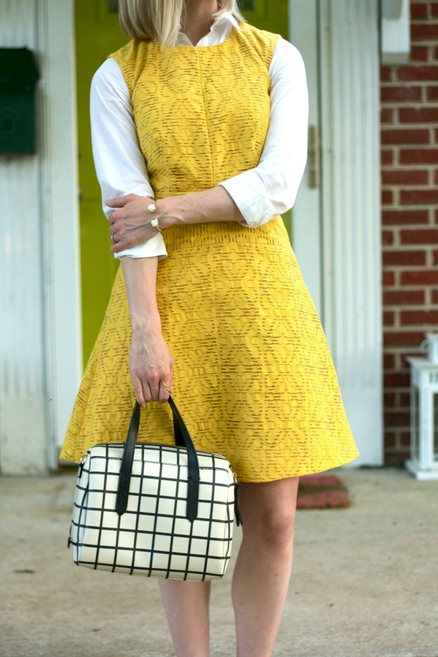 yellow dress over white shirt, nude studded t-strap pumps
