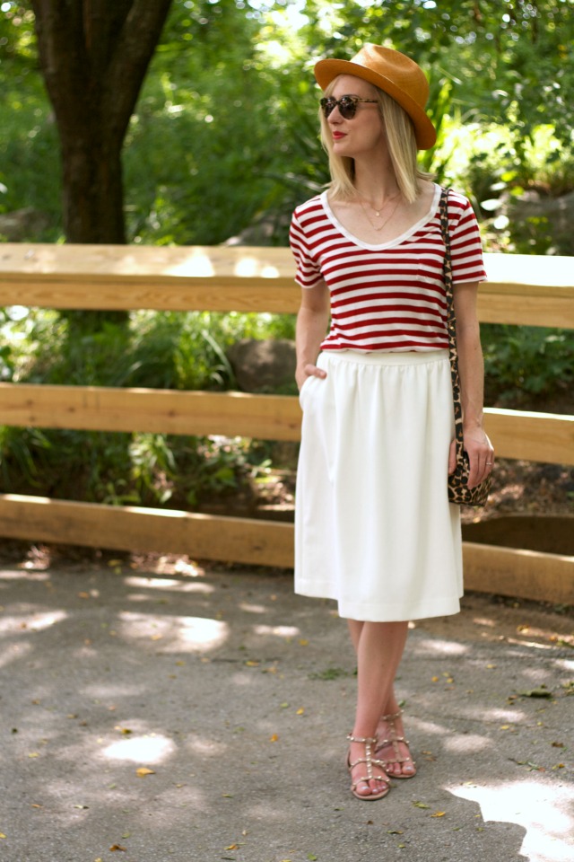 striped tee, white midi skirt, gladiator sandals, Panama hat