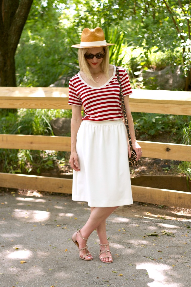 striped tee, white midi skirt, gladiator sandals, Panama hat