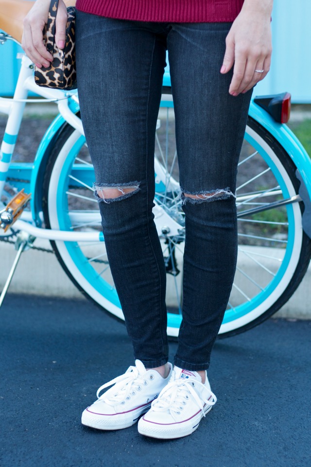 Hillflint Indiana sweater, distressed black skinny jeans, white Chucks, Cape Cod bike