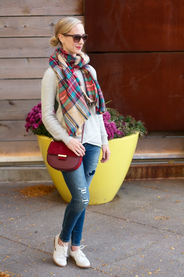 plaid blanket scarf, colorblock sweater, cream oxfords, burgundy saddlebag