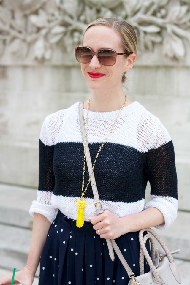 polka dot midi skirt, colorblock sweater, ankle strap pumps, tassel necklace