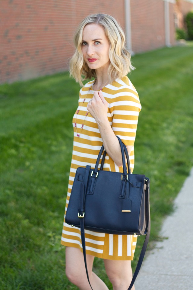 yellow stripe dress, navy satchel, Kate Spade bow necklace
