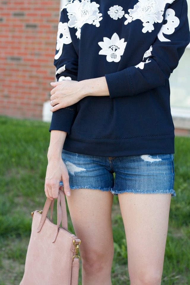 embroidered Victoria Beckham for Target sweatshirt, distressed jean shorts, Kate Spade Keds sneakers