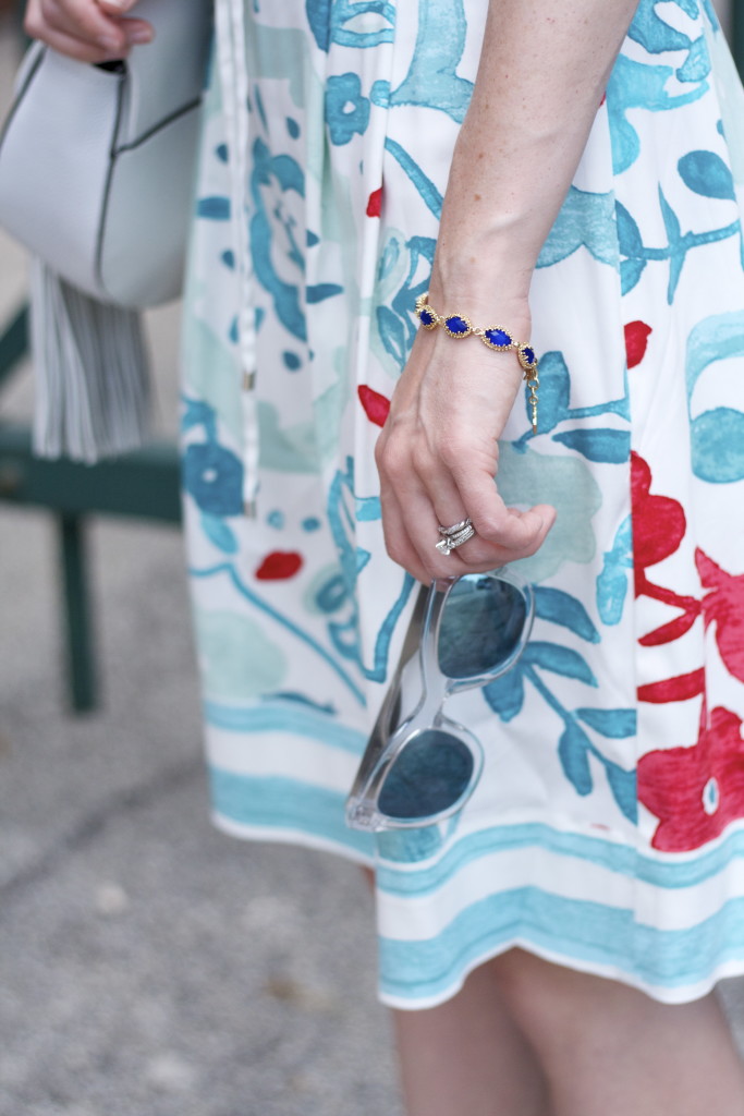 Club Monaco stripe tee, floral print skirt, Rebecca Minkoff saddle bag