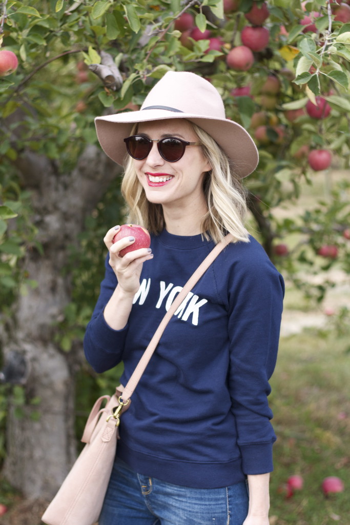 new york sweatshirt, white chuck taylors, felt hat, apple picking