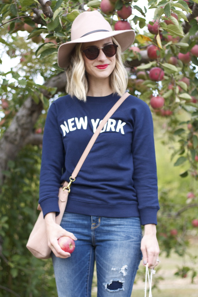 new york sweatshirt, white chuck taylors, felt hat, apple picking