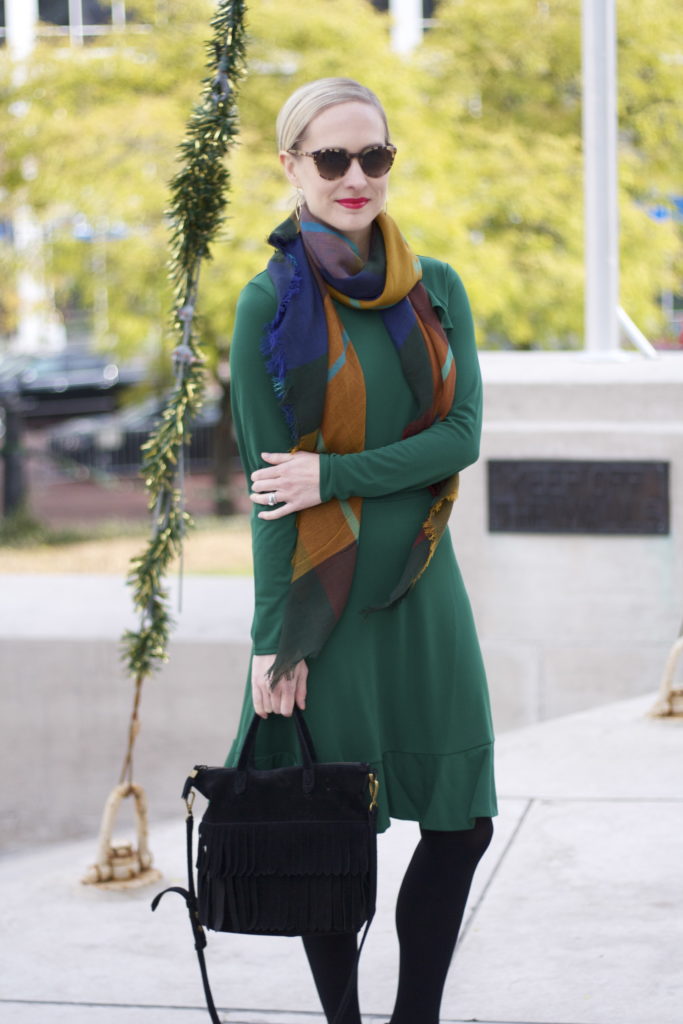 green dress, plaid scarf, bow pumps