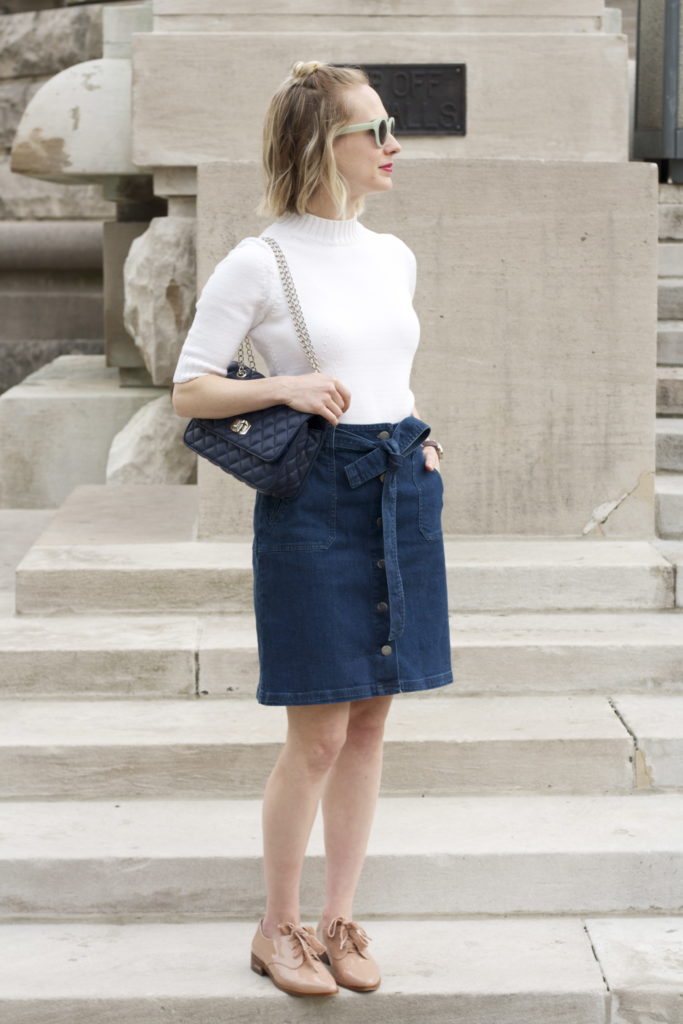jean skirt, turtleneck, navy quilted bag, blush oxfords