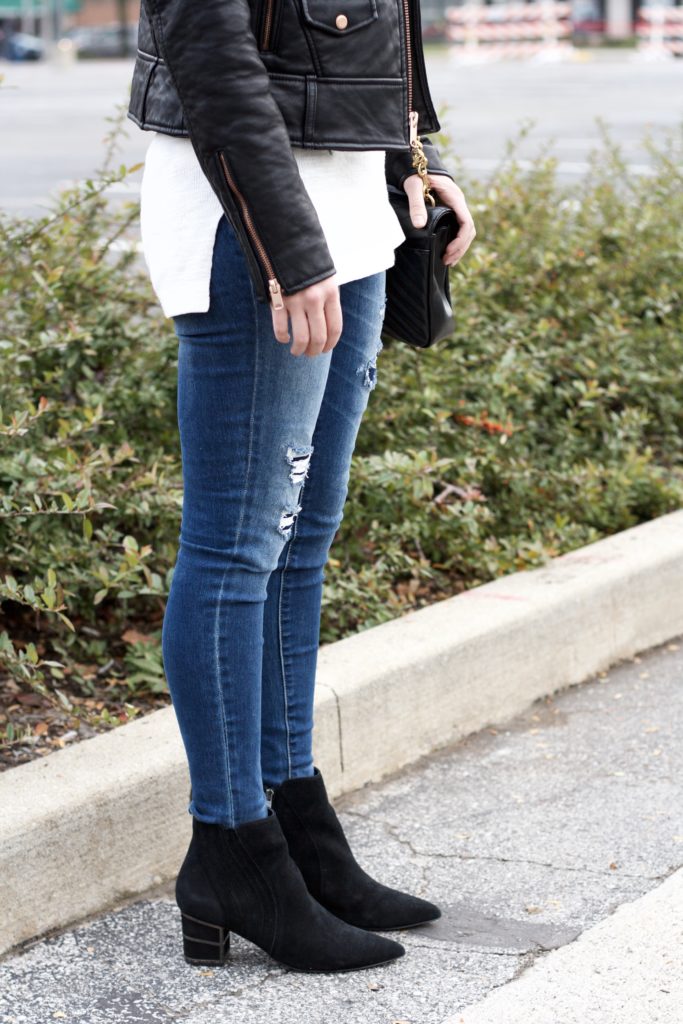 tunic sweater, faux leather moto jacket, distressed skinny jeans, suede ankle boots, YSL college bag