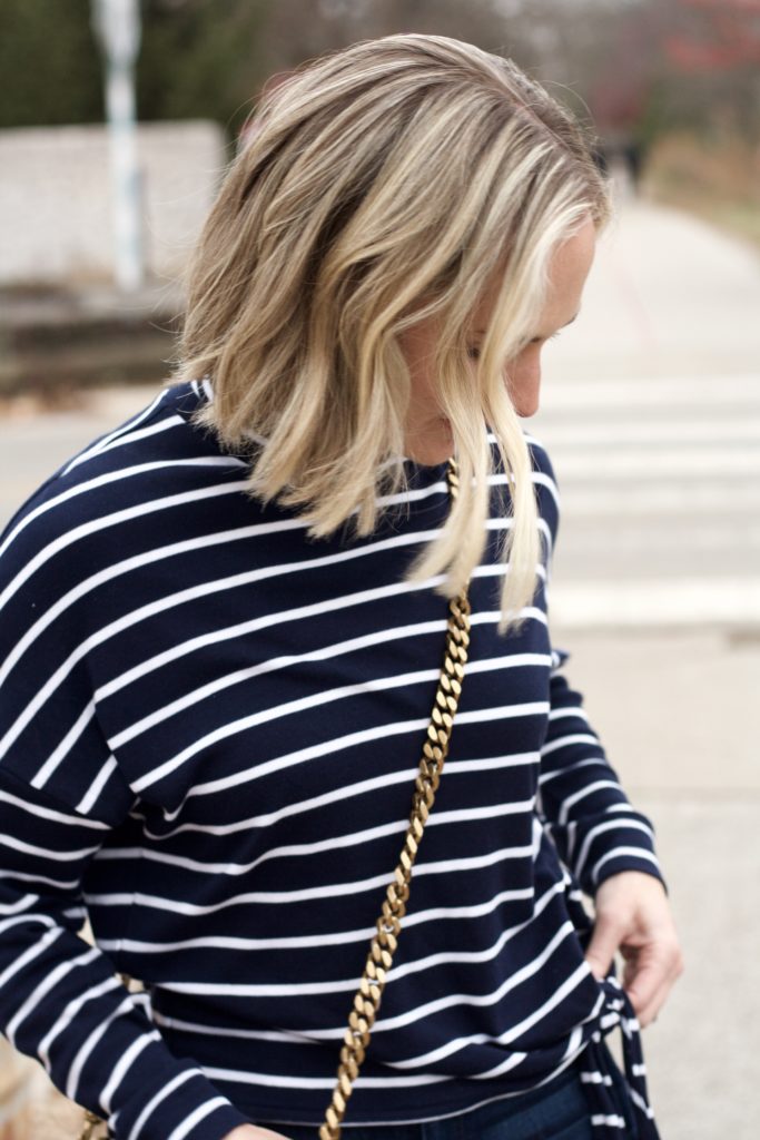 striped turtleneck, suede ankle boots, YSL college bag