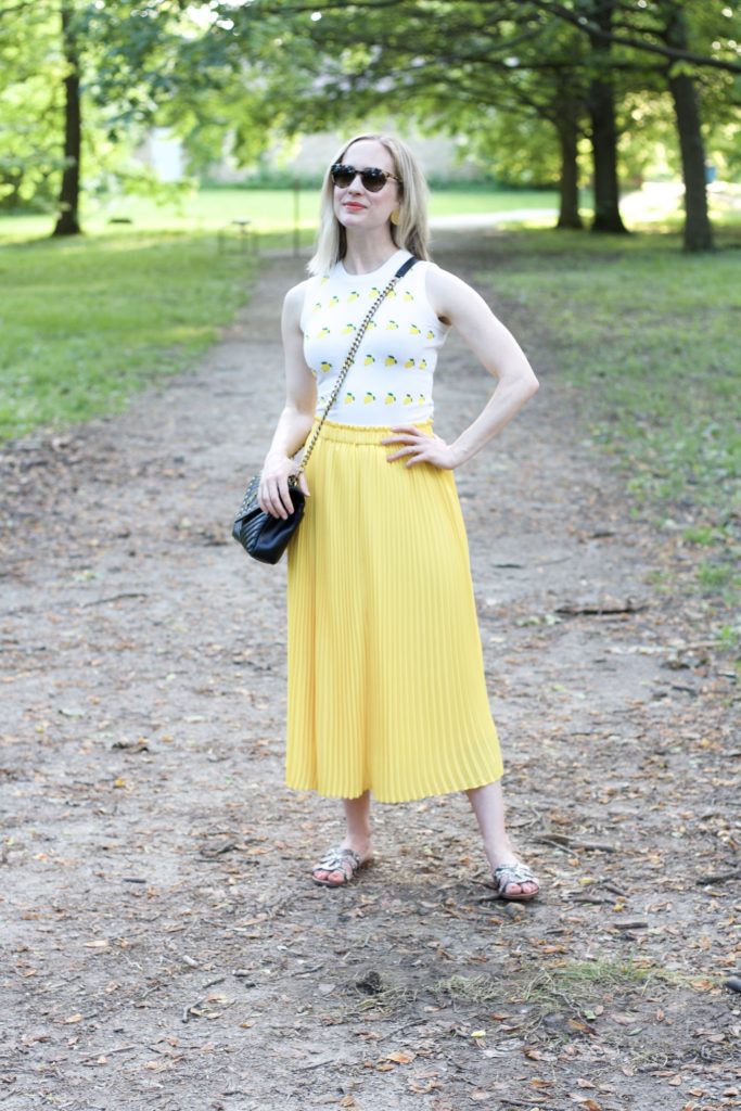 snake sandals, yellow pleated maxi skirt, lemon print stop, YSL college bag medium