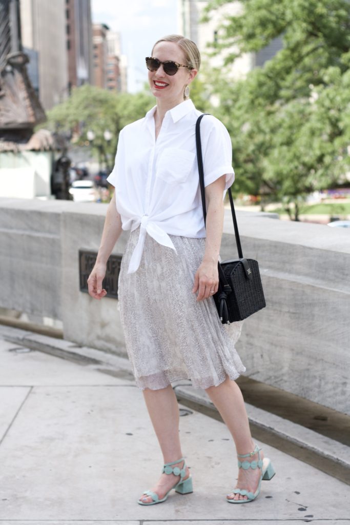 midi skirt, tie front shirt, straw bag