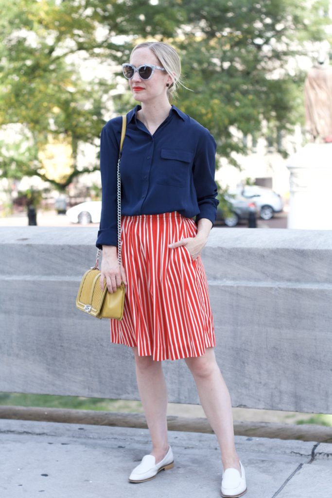 silk blouse, striped skirt, Everlane loafers, mustard bag, Balenciaga sunglasses