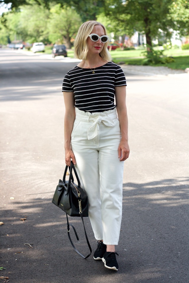 white paperbag waist jeans, Cole Haan sneakers, retro sunglasses