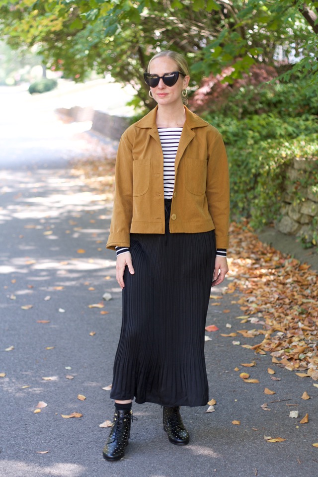 sezane studded booties, flat boots, black midi skirt, ysl heart sunglasses