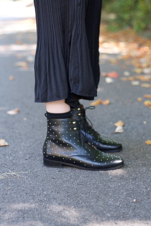 sezane studded booties, flat boots, black midi skirt, ysl heart sunglasses