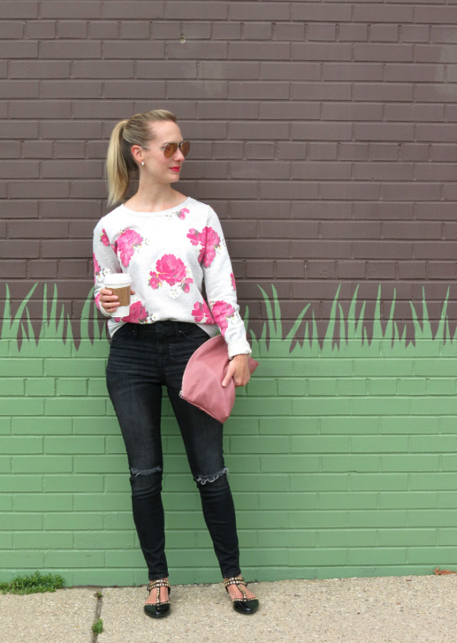 high rise faded black jeans, floral sweatshirt, studded flats