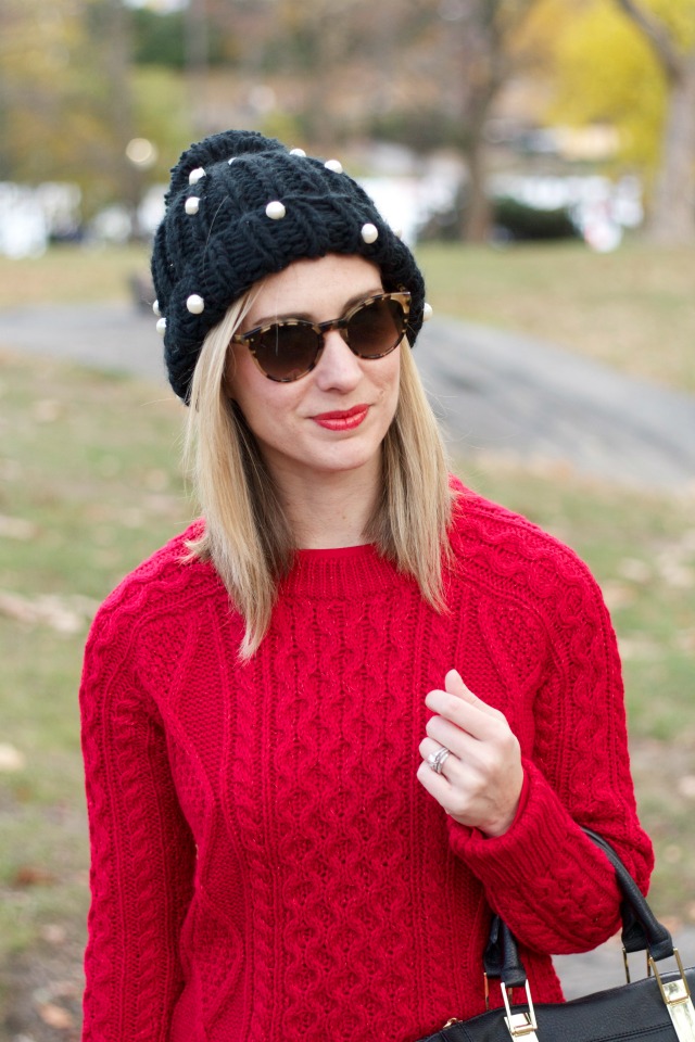 red sweater, faux leather leggings, white Chucks, J.Crew wool trench, cable knit beanie
