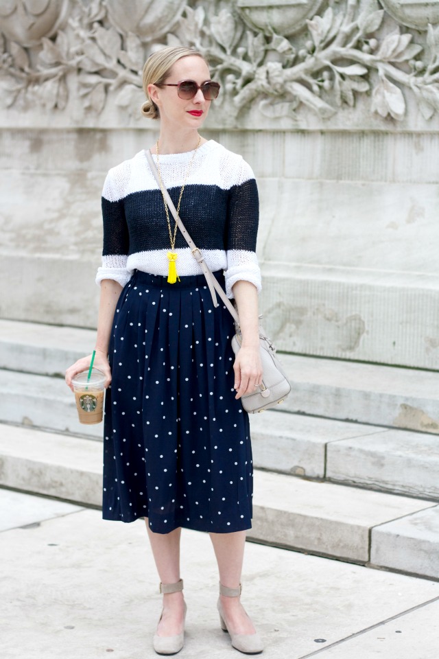 polka dot midi skirt, colorblock sweater, ankle strap pumps, tassel necklace