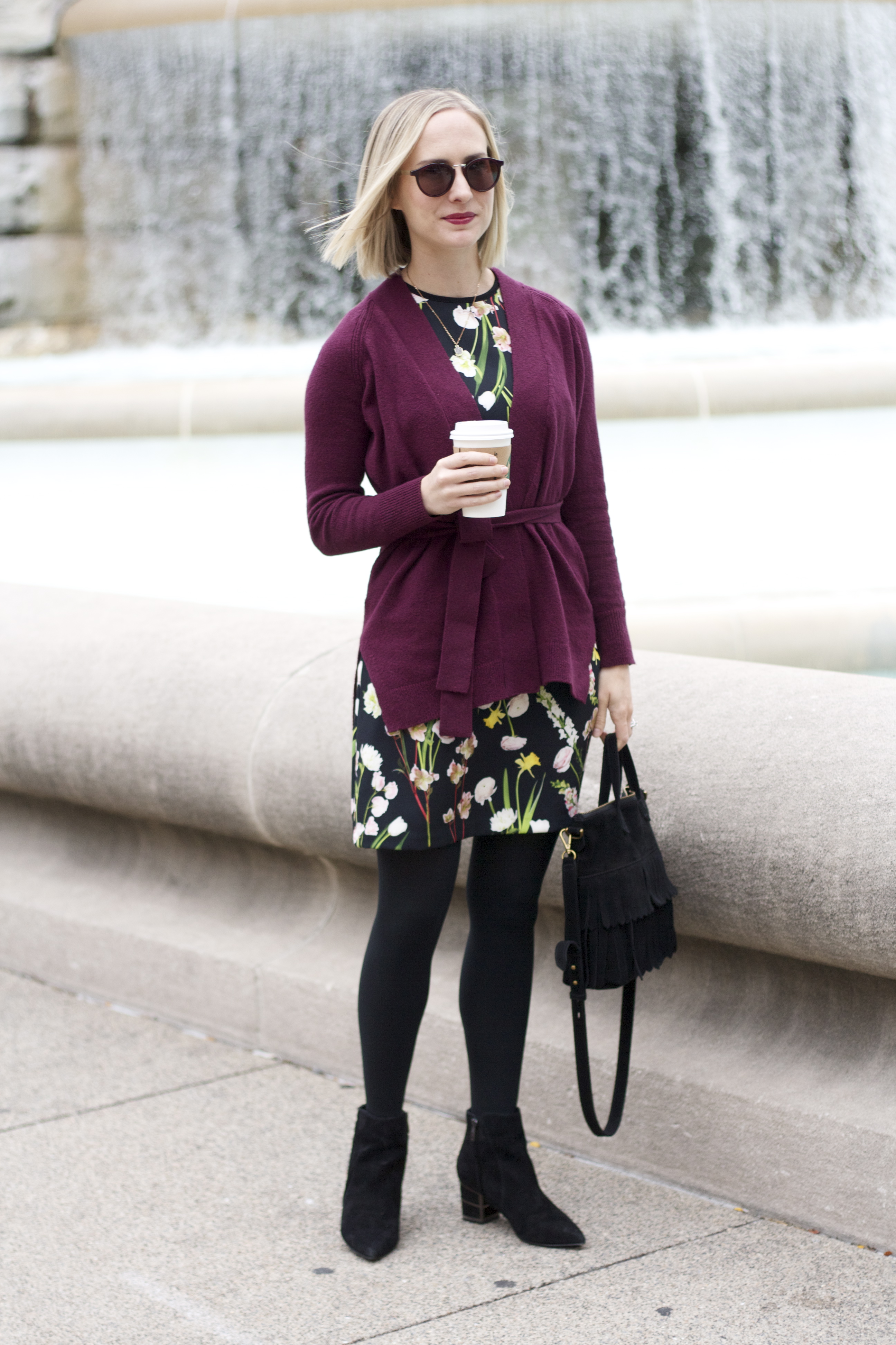 bugundy wrap sweater, floral dress with tights and ankle boots